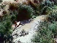 Naked video of Ellen Barkin laying in the nude resting by a stream. Watch her slowly wash her beautiful body with big boobs, erect nipples and golden blonde pussy.